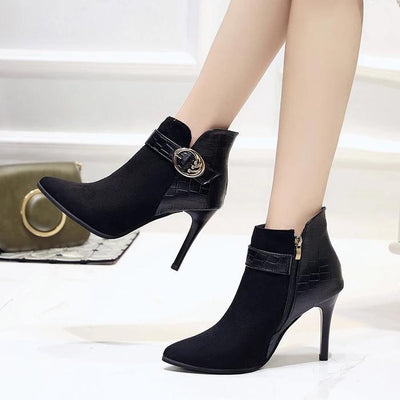 Martin boots with pointed toe and stiletto heels